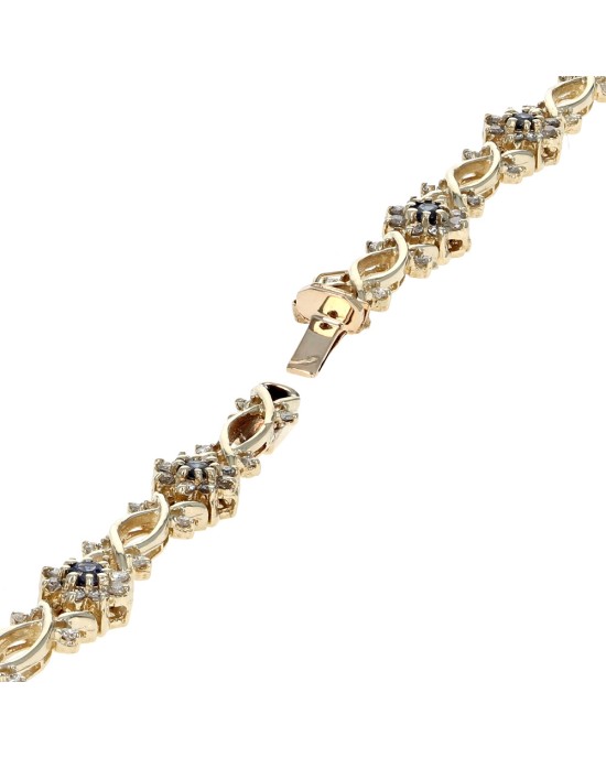 Diamond and Blue Sapphire Crossover Flower Link Bracelet in White Gold